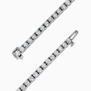A 14K White Gold Diamond Tennis Bracelet, 6.50 TCW, featuring a continuous row of round sparkling diamonds set in prongs, displayed on a plain white background.