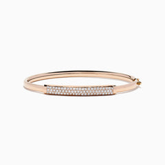 The 14K Rose Gold Diamond Pave Bangle, 1.00 TCW, features a rectangular diamond-encrusted section and is elegantly displayed on a plain white background.
