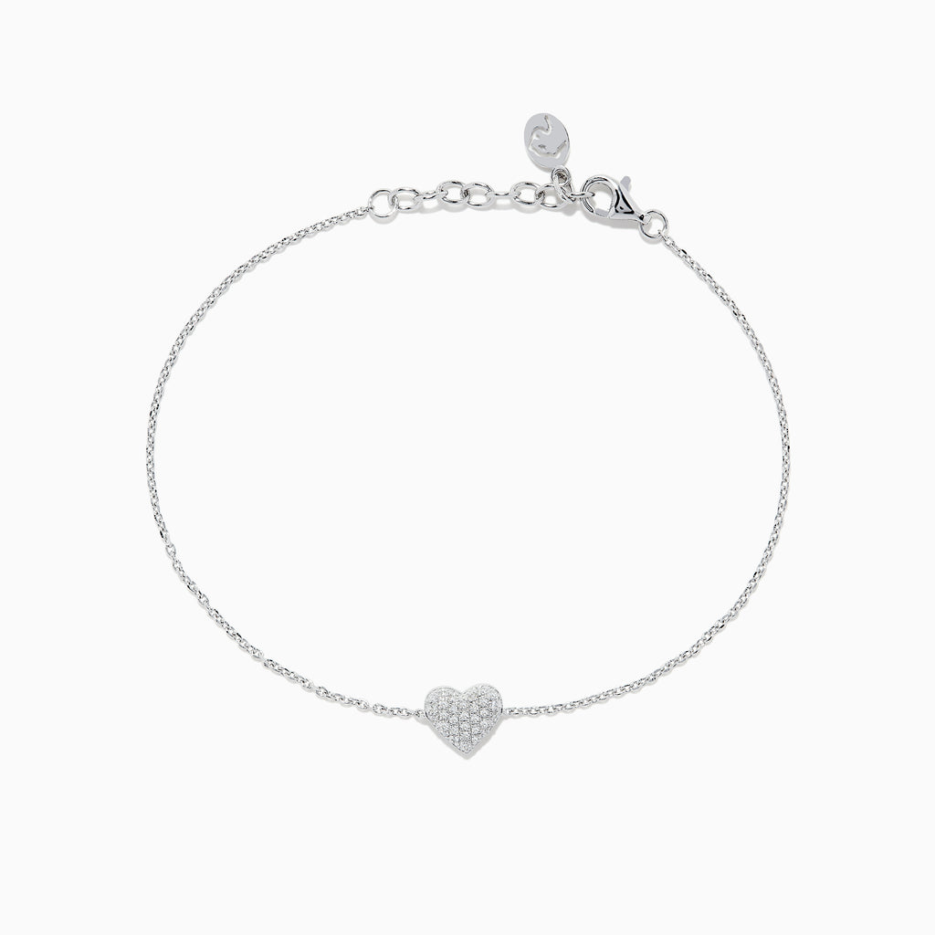 The 925 Sterling Silver Diamond Heart Bracelet features a delicate chain with a small, crystal-studded heart charm, finished with an adjustable lobster clasp.