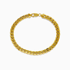 The 14K Yellow Gold 9 Cuban Chain Link Bracelet is displayed in a circular shape on a white background, featuring a secure lobster clasp.