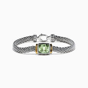 The 925 Sterling Silver & 18K Gold Green Amethyst Bracelet, 4.70 TCW, showcases a square green amethyst centerpiece set in woven silver with gold accents and a circular clasp.