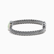 A 925 sterling silver and 18K gold bracelet with green amethyst (4.70 TCW), featuring a woven mesh design and rectangular clasp, shown from the side against a white background.