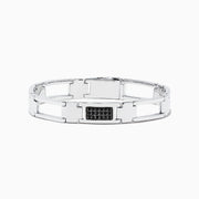 The Mens Sterling Silver Black Sapphire Link Bracelet features a geometric design with a rectangular black sapphire accent at the center.