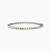 The 925 Sterling Silver Opal Tennis Bracelet features round opals totaling 4.50 TCW, each set in individual prongs and elegantly showcased on a white background.