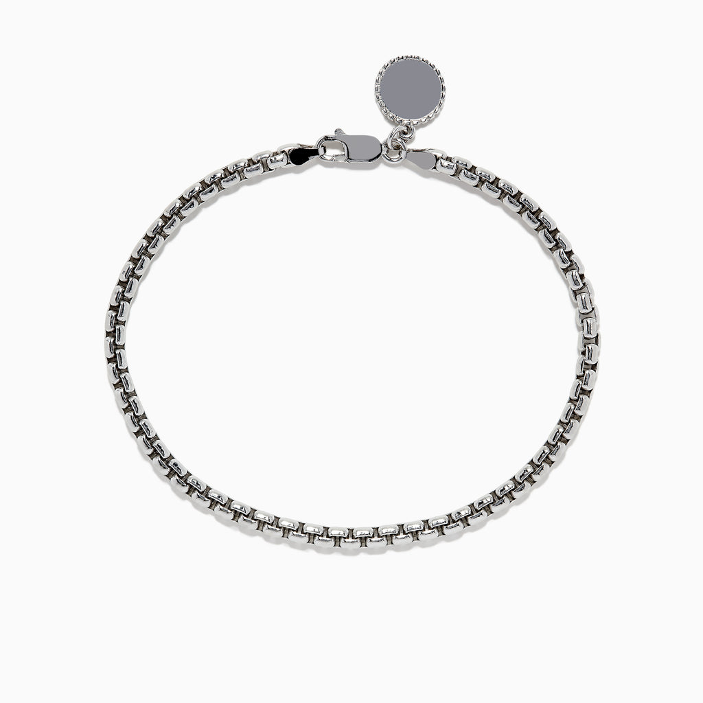 The Mens Sterling Silver 8 Box Link Bracelet features a round blank charm near the clasp and is displayed against a white background.