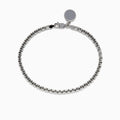 The Mens Sterling Silver 8 Box Link Bracelet features a round blank charm near the clasp and is displayed against a white background.