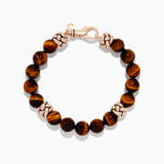 The Mens 925 Sterling Silver Rose Gold Plated Tigers Eye Bead Bracelet features polished brown Tigers Eye beads and rose gold-plated silver accents with a matching clasp, shown on a white background.
