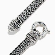 The Mens 925 Sterling Silver Braided Chain Malachite Bracelet 10.20 TCW showcases a bold rectangular green malachite centerpiece on a woven sterling silver chain with a secure clasp.