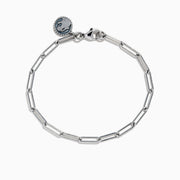 The 925 Sterling Silver Paperclip Chain Bracelet features elongated oval links and a round engraved charm, shown on a white background.