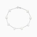 The 14K White Gold Cultured Fresh Water Pearl Station Bracelet features evenly spaced pearls and a lobster clasp, shown on a white background.