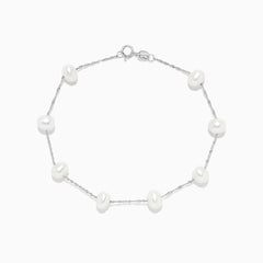 The 14K White Gold Cultured Fresh Water Pearl Station Bracelet features evenly spaced pearls and a lobster clasp, shown on a white background.