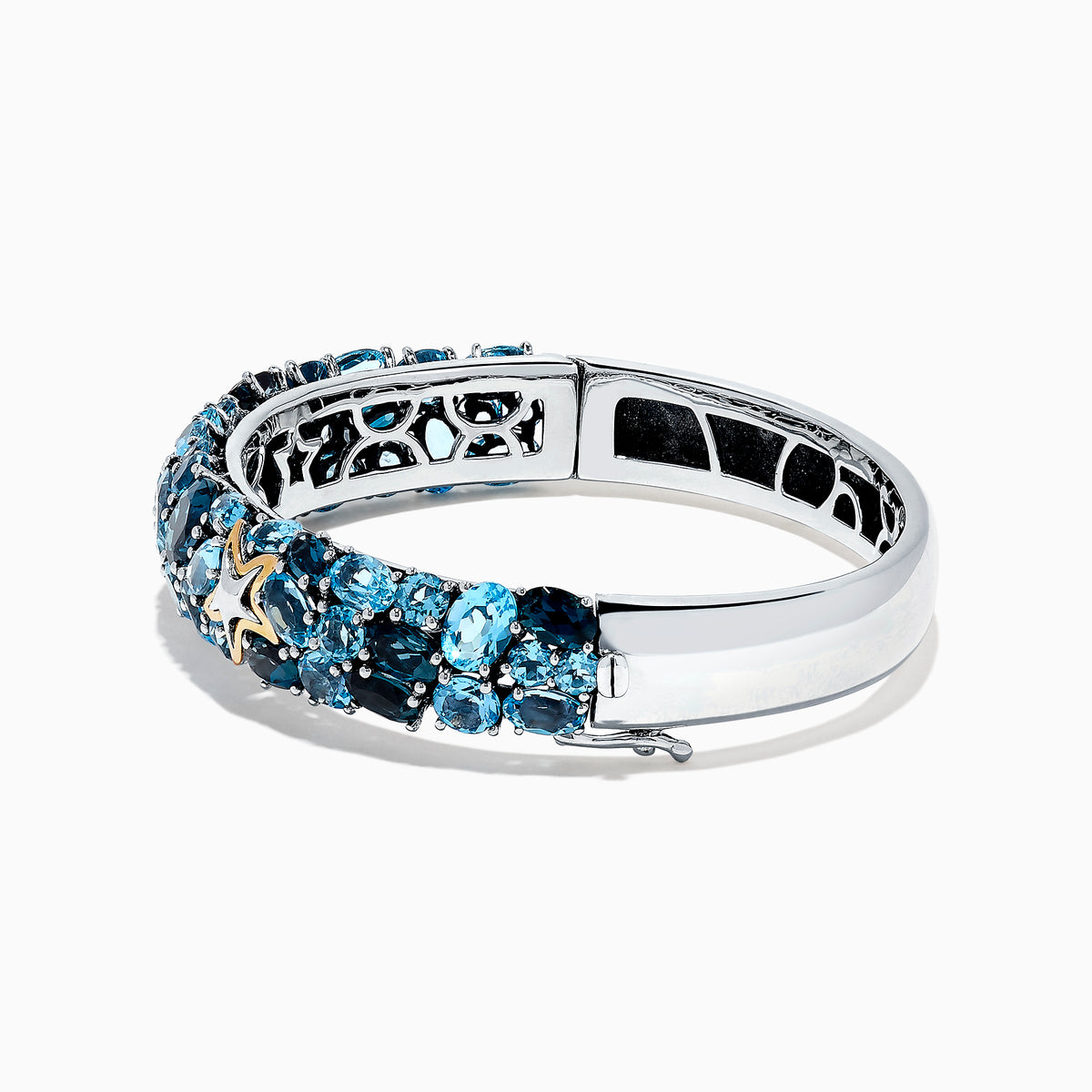 The Seaside Silver and 18K Gold Blue Topaz Starfish Bangle, 26.80 TCW, features clusters of blue topaz gemstones, gold star-shaped accents, and an openwork honeycomb pattern on the inner band.