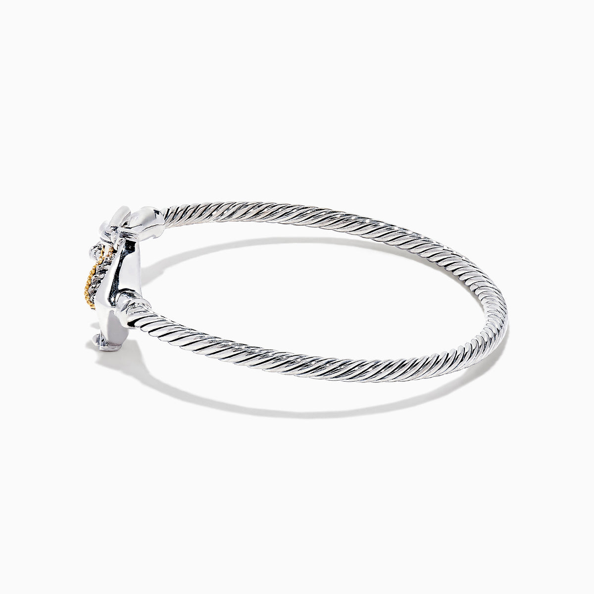 The Seaside Sterling Silver & 18K Gold Anchor Bangle features a twisted cable design, an anchor-shaped clasp, and rope detail for a nautical touch, showcased on a white background.