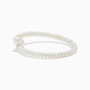 The 14K Yellow Gold Cultured Fresh Water Pearl Wrap Bracelet features small cultured pearls, two larger center pearls, and two yellow gold beads, all showcased on a white background.