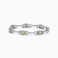 An elegant 18K two tone gold bracelet featuring rectangular yellow gemstones and white diamonds (4.37 TCW), with each gem framed by diamonds and joined by diamond-studded links in an intricate design.