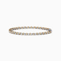 The 14K Two Tone Gold Yellow and White Diamond Tennis Bracelet, 4.30 TCW, features a continuous row of sparkling diamonds in alternating yellow and white gold links, displayed against a white background.