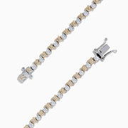 The 14K Two Tone Gold Yellow and White Diamond Tennis Bracelet, 4.30 TCW, features a continuous row of sparkling diamonds in alternating yellow and white gold links, displayed against a white background.