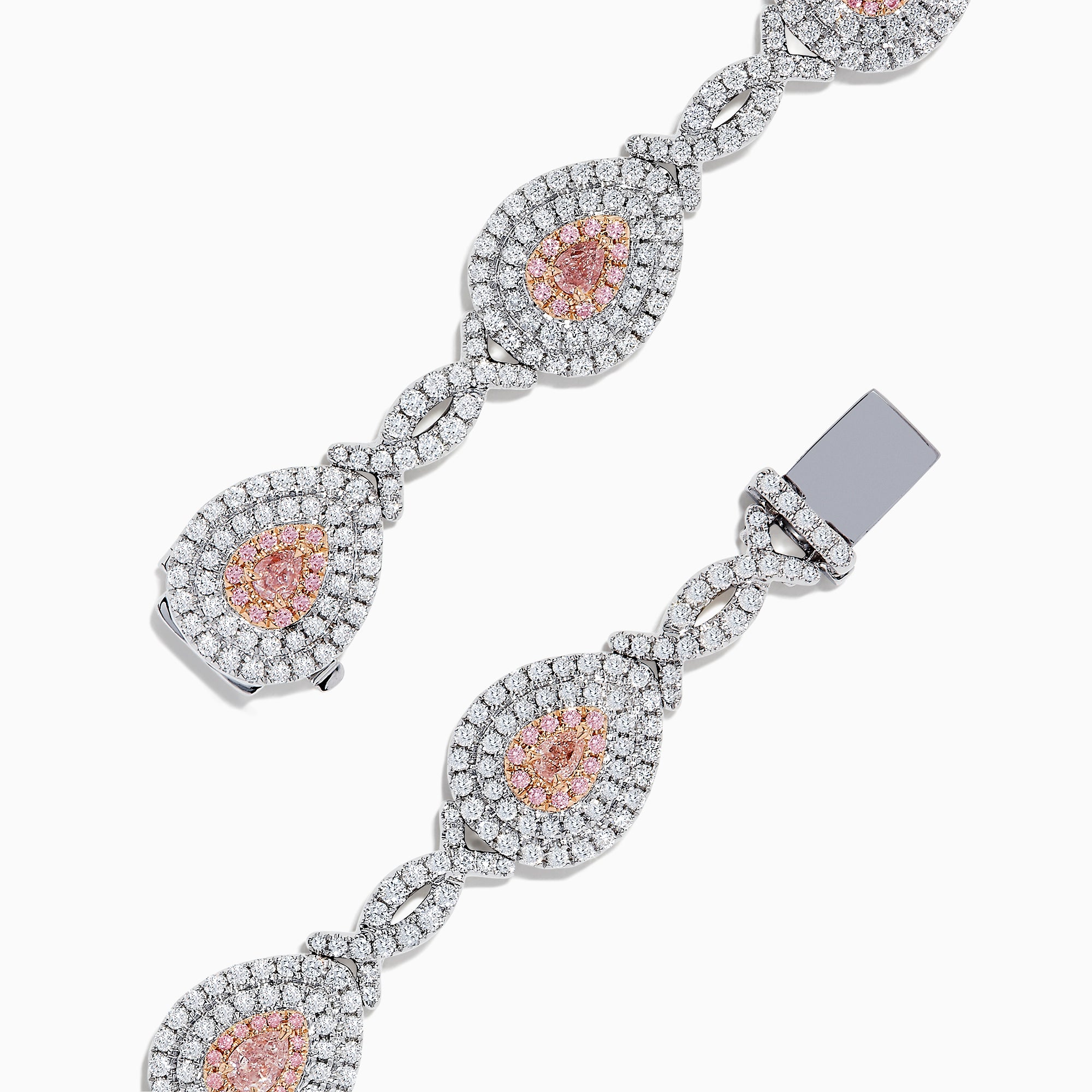 18K two-tone gold bracelet featuring GIA certified pink diamonds (5.39 TCW) in oval and marquise shapes, accented by small clear stones and detailed filigree on the sides.