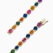 The 14K Yellow Gold Multi Sapphire and Diamond Bracelet (11.16 TCW) features a single row of round sapphires in blue, green, pink, and yellow hues, accented with diamonds and finished with a secure clasp.