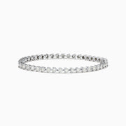 The Pave Classica 14K White Gold Diamond Tennis Bracelet 1.96 TCW features a single row of sparkling diamonds, elegantly set in 14K white gold and photographed on a white background.