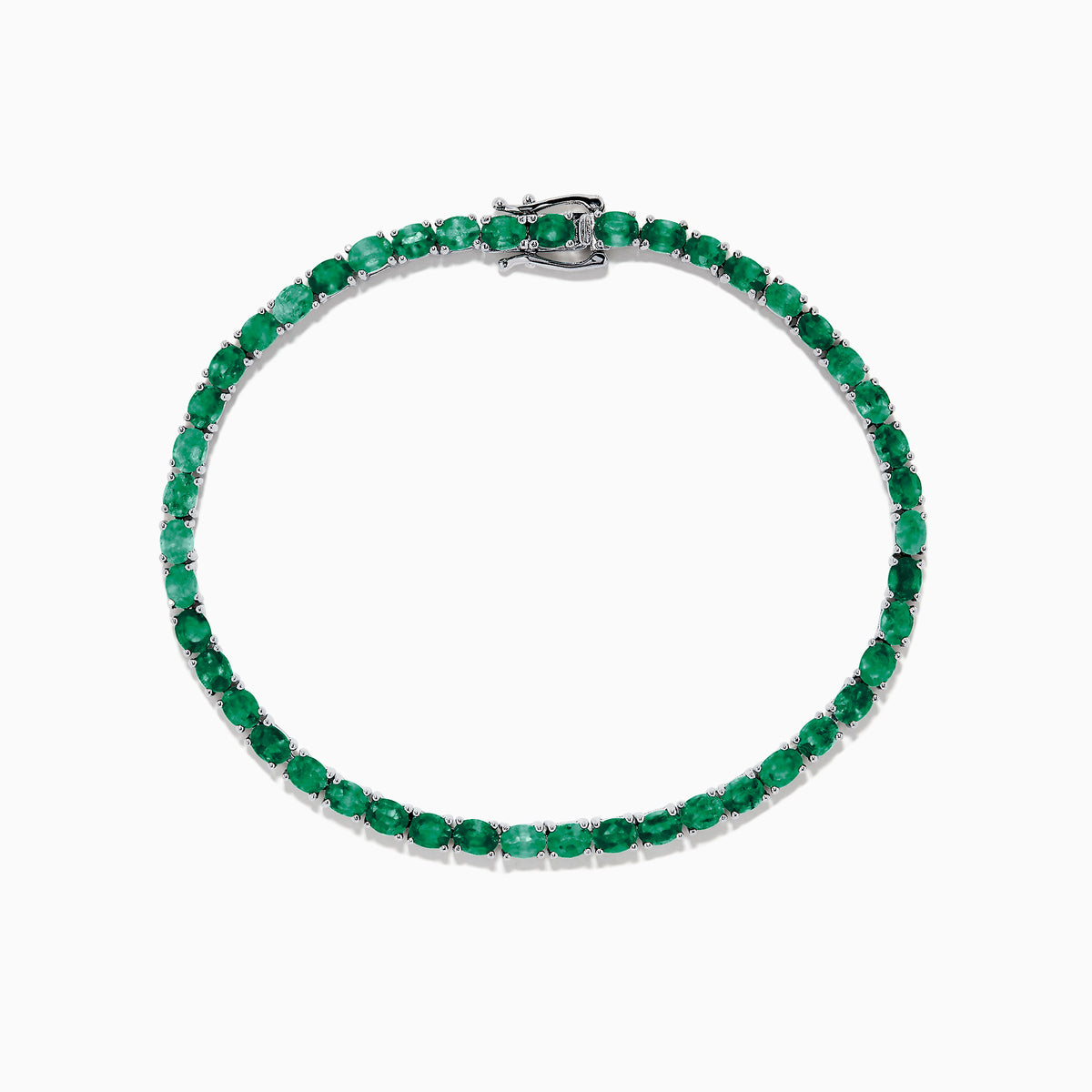 The 925 Sterling Silver Emerald Tennis Bracelet, 6.99 TCW, features a single row of round-cut green gemstones set in sterling silver with a secure clasp, shown elegantly on a white background.