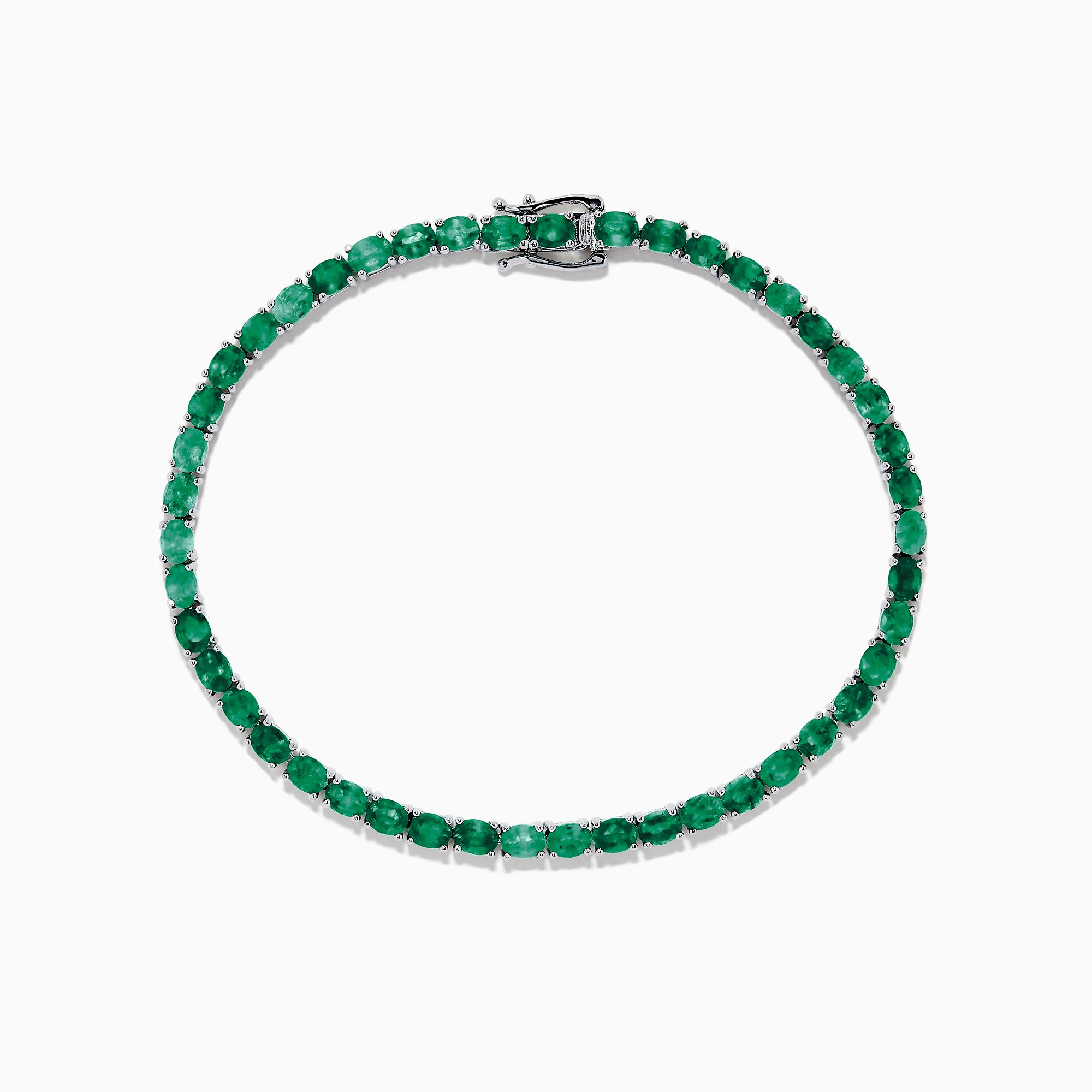 The 925 Sterling Silver Emerald Tennis Bracelet, 6.99 TCW, features a single row of round-cut green gemstones set in sterling silver with a secure clasp, shown elegantly on a white background.