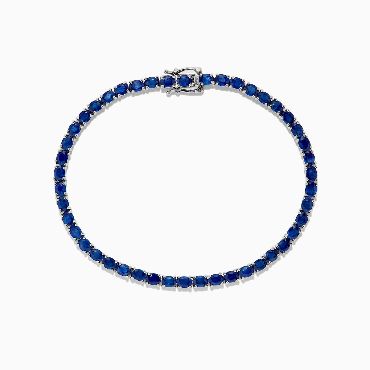The 925 Sterling Silver Blue Sapphire Tennis Bracelet, 6.99 TCW, features evenly spaced round blue sapphires set in a slender sterling silver band and is finished with a secure clasp.