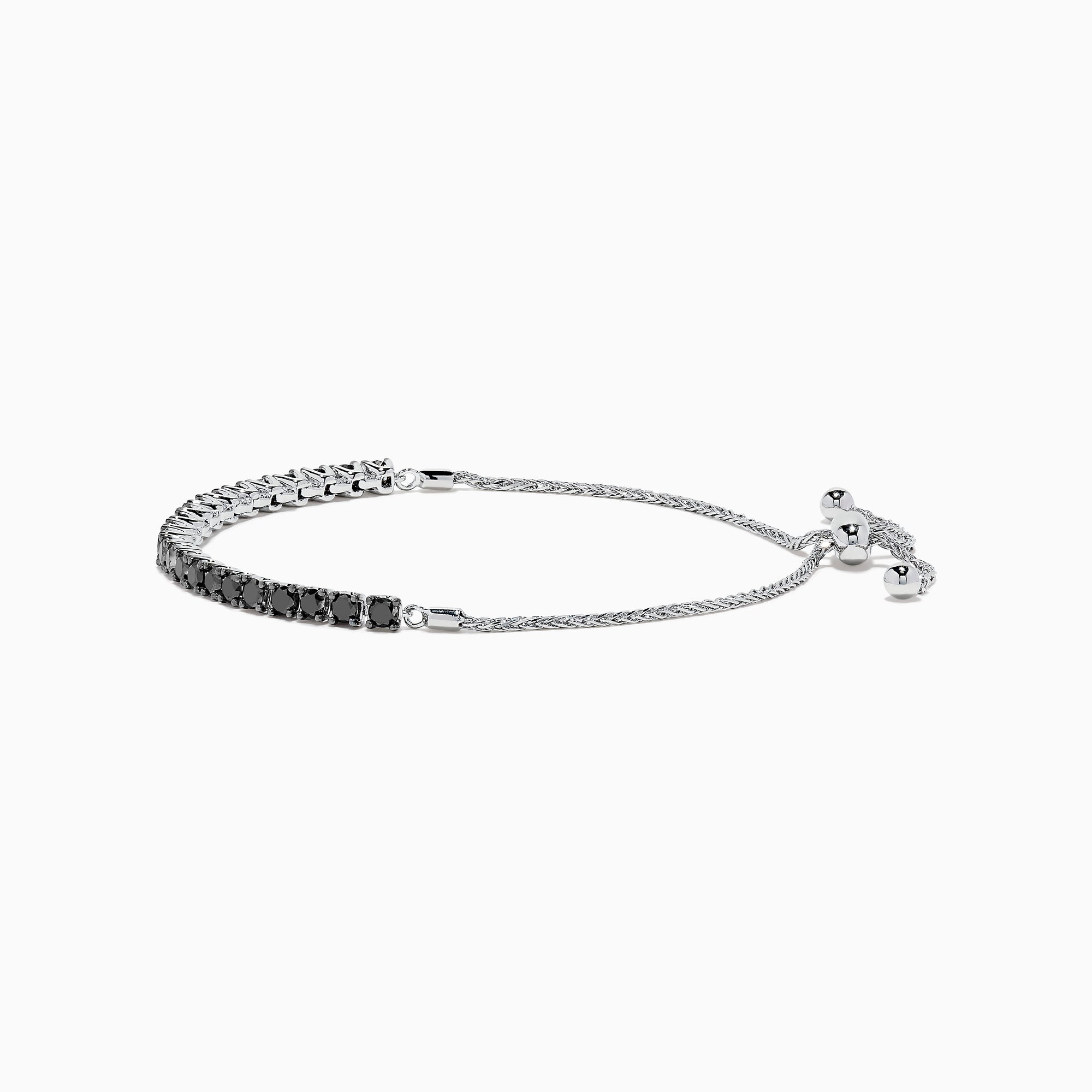 The 14K White Gold Black Diamond Bolo Bracelet features a row of round black diamonds set in a single line, secured with a sliding clasp and accented by two bead ends on the chain.