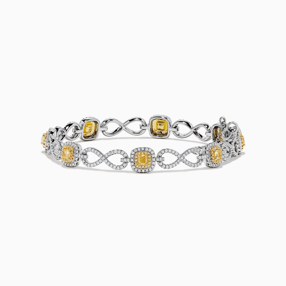 The Canare 14K Two Tone Gold Yellow and White Diamond Infinity Tennis Bracelet, 3.34 TCW, features an intricate infinity pattern set with yellow gemstones framed by diamonds and a secure right-side clasp.