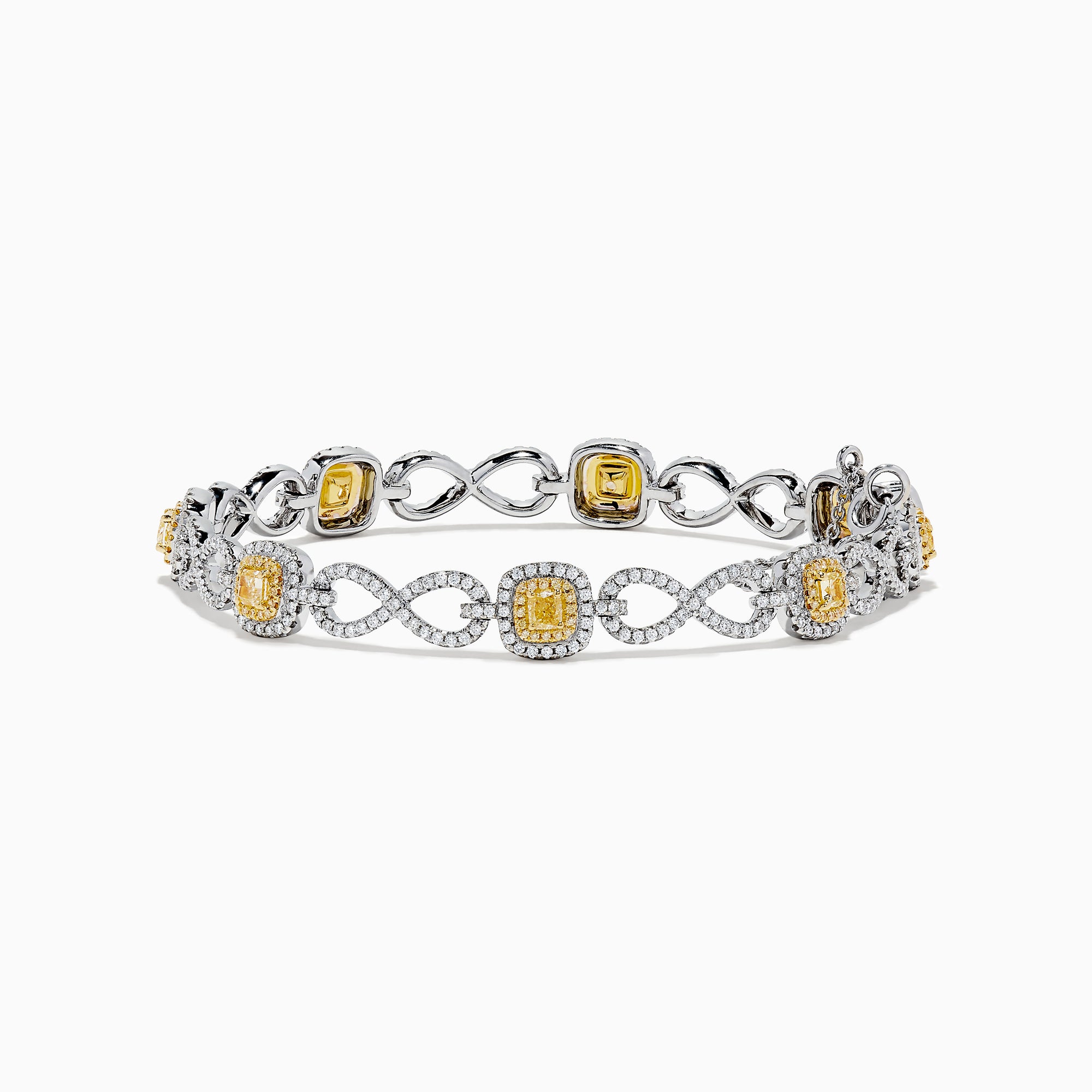 The Canare 14K Two Tone Gold Yellow and White Diamond Infinity Tennis Bracelet, 3.34 TCW, features an intricate infinity pattern set with yellow gemstones framed by diamonds and a secure right-side clasp.