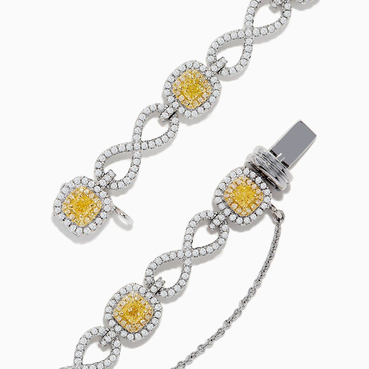 The Canare 14K Two Tone Gold Yellow and White Diamond Infinity Tennis Bracelet, 3.34 TCW, features an intricate infinity pattern set with yellow gemstones framed by diamonds and a secure right-side clasp.