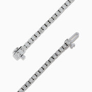 The Pave Classica 14K White Gold Diamond Tennis Bracelet 2.99 TCW, with a sleek row of sparkling diamonds, is displayed on a plain white background.
