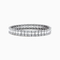 The Classique 14K White Gold Diamond Tennis Bracelet 10 TCW showcases two rows of round diamonds flanking a center row of baguette-cut diamonds, all set in stunning white gold against a white background.