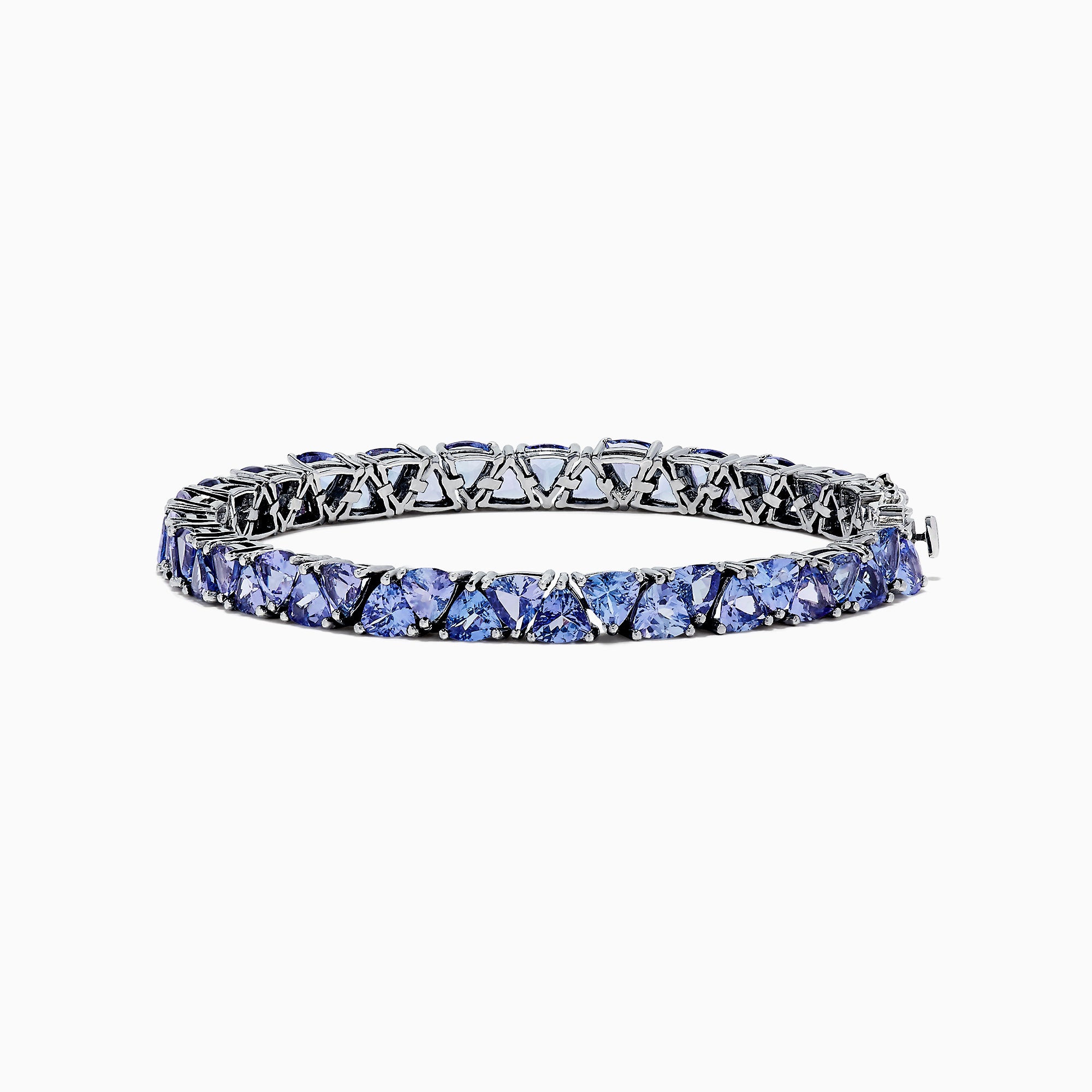 The Nahla Siri Sterling Silver Tanzanite Tennis Bracelet, 18.62 TCW, features a row of square-cut tanzanite gemstones in individual prongs and a secure clasp for an elegant, polished look.