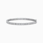 The 925 Sterling Silver Diamond Tennis Bracelet showcases a continuous row of sparkling diamonds set in sterling silver links, displayed on a plain white background.