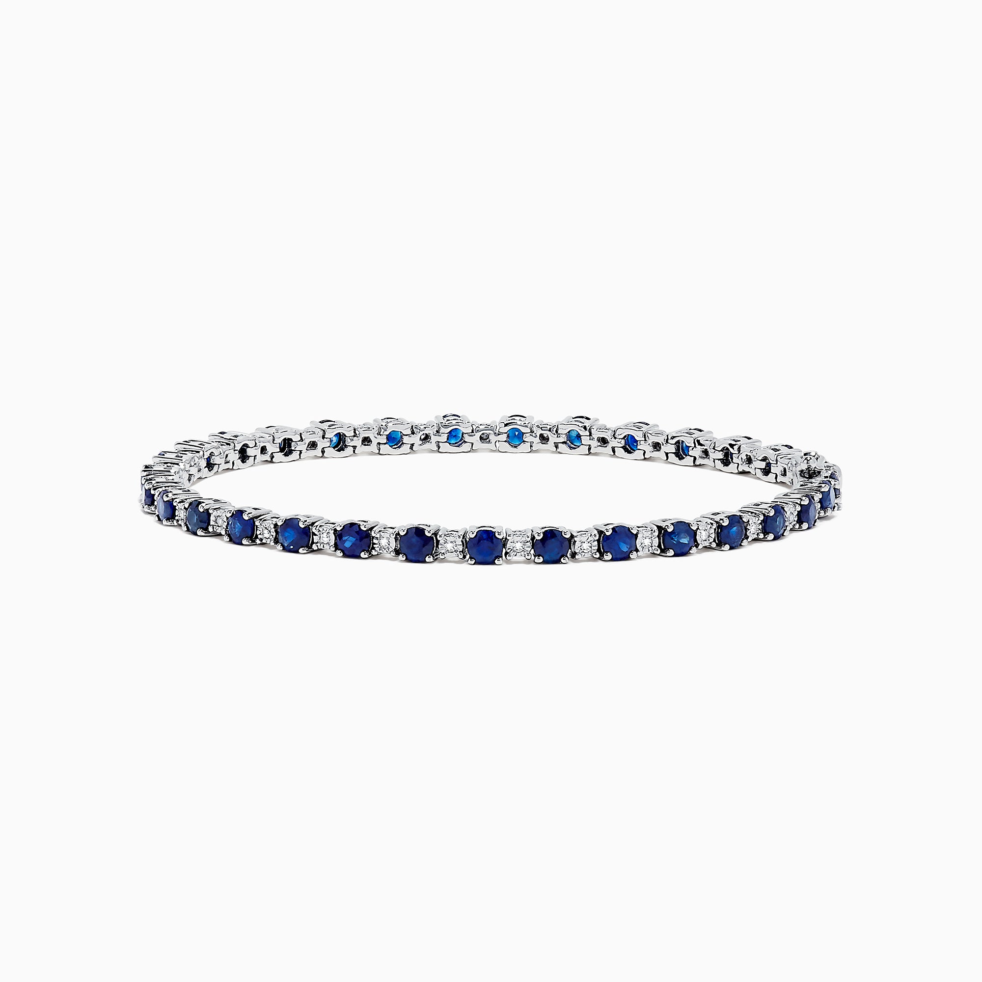 The Royale Bleu 14K Gold Sapphire and Diamond Tennis Bracelet, 4.24 TCW, showcases alternating round blue sapphires and diamonds, elegantly displayed on a white background.