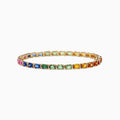 The Watercolors 14K Yellow Gold Multi Sapphire and Diamond Bracelet features rectangular sapphires in a gradient rainbow of pink, blue, green, yellow, and orange for a sparkling, continuous loop on your wrist.