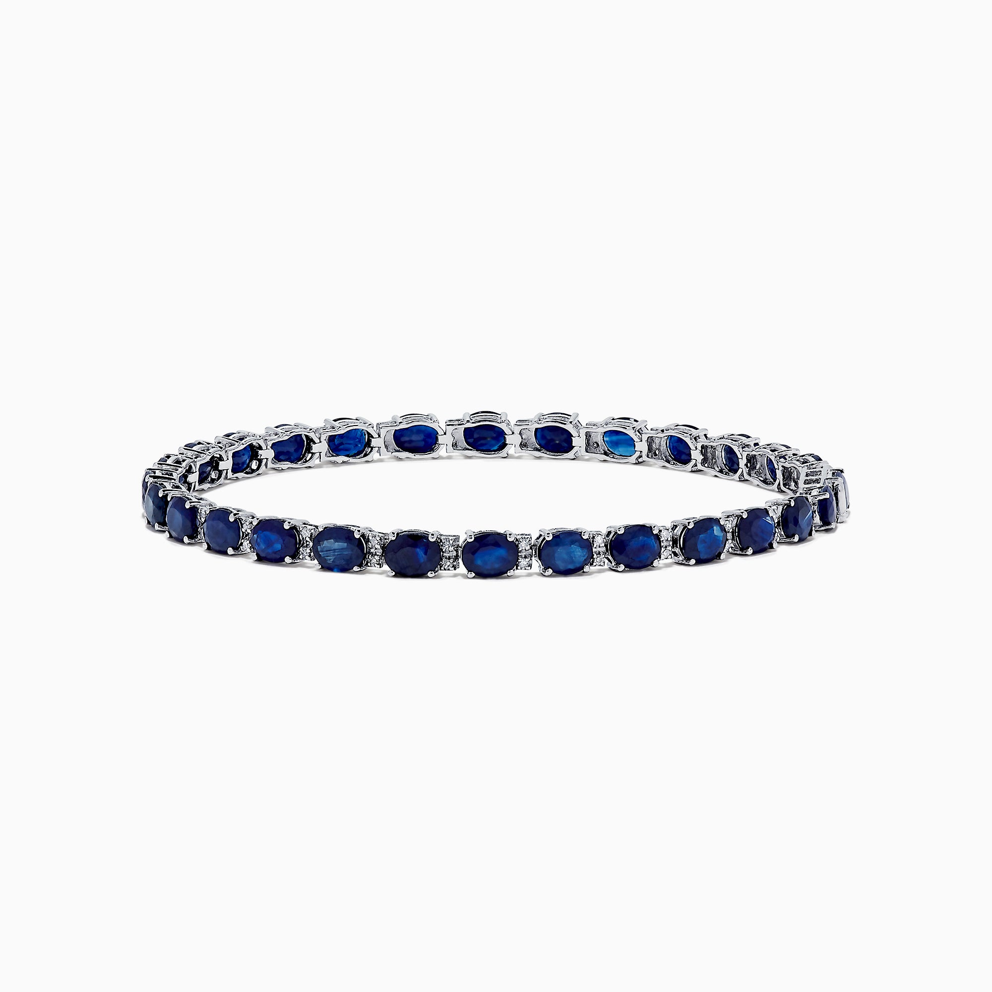 The Royale Bleu 14K Gold Sapphire & Diamond Tennis Bracelet features a continuous row of oval sapphires and diamonds, totaling 12.21 TCW, set in prongs for an elegant and timeless look.