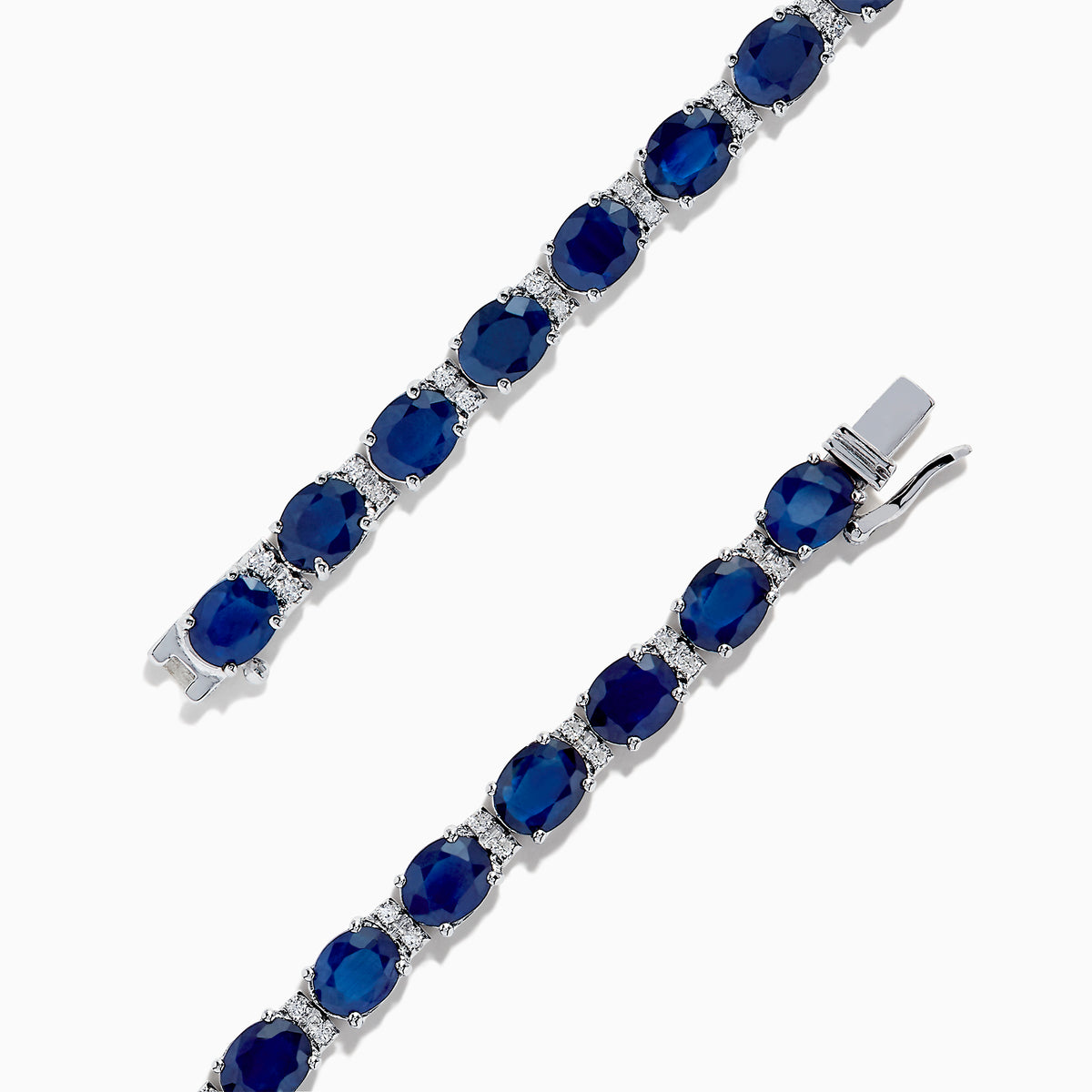 The Royale Bleu 14K Gold Sapphire & Diamond Tennis Bracelet features a continuous row of oval sapphires and diamonds, totaling 12.21 TCW, set in prongs for an elegant and timeless look.
