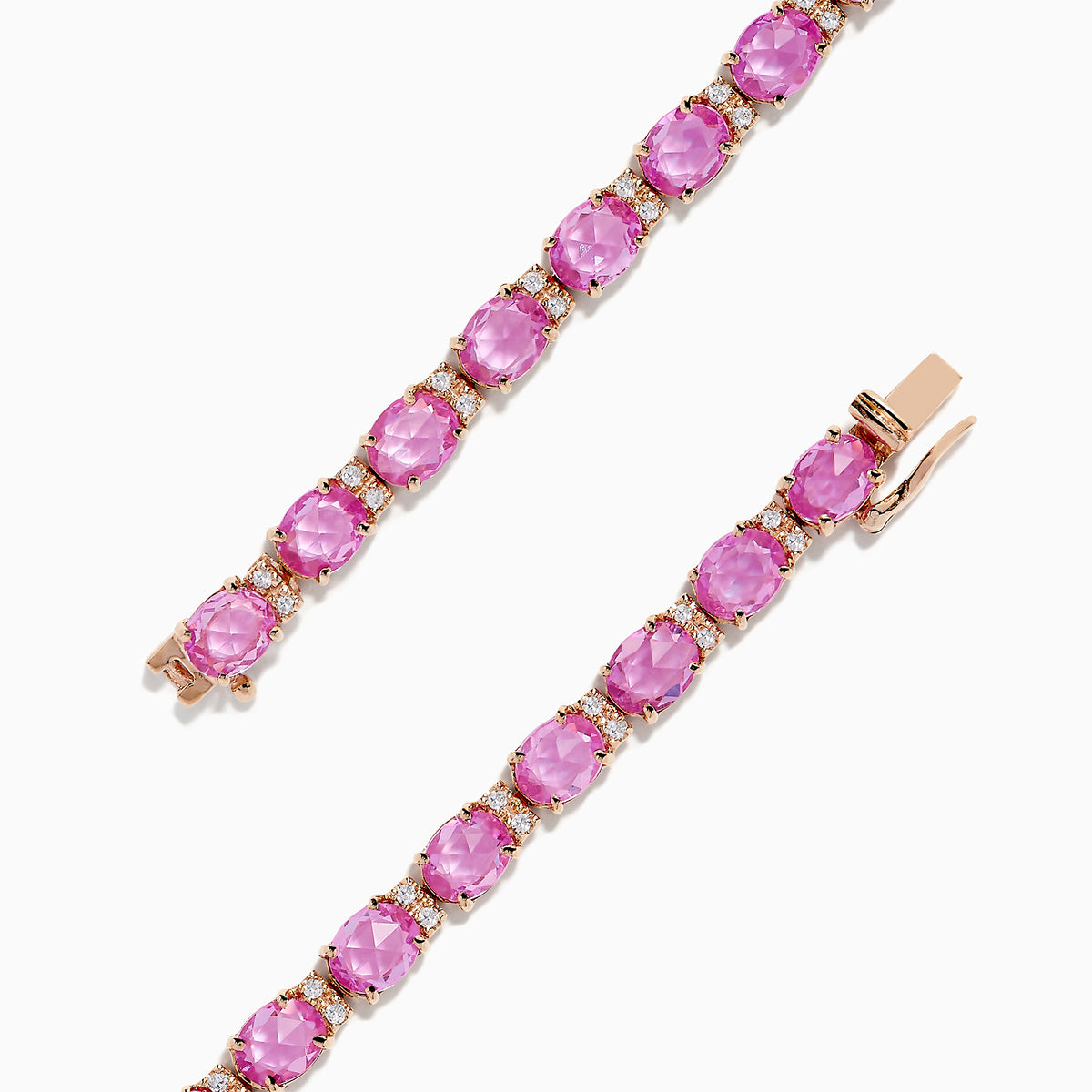 The 14K Rose Gold Pink Sapphire and Diamond Tennis Bracelet, 9.03 TCW, features round pink sapphires in prong settings with small diamond accents. Shown unclasped on a white background.