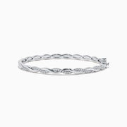 The 925 Sterling Silver Diamond Bangle features an elegant twisted design with alternating smooth sections and sparkling diamond accents.