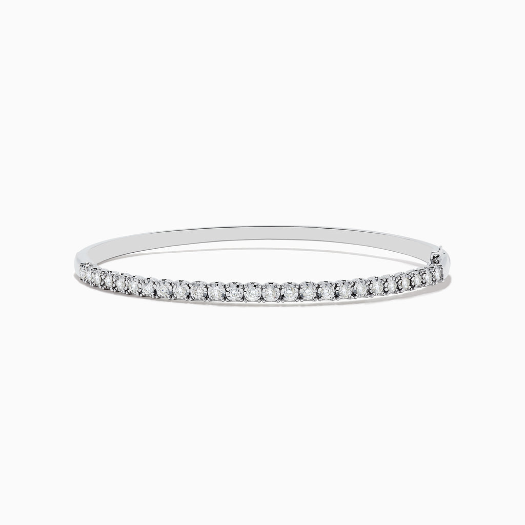 The Pave Classica 14K White Gold Diamond Bangle features a thin, silver design with a row of sparkling diamonds (0.98 TCW) along the top half, shown against a plain white background.