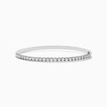 The Pave Classica 14K White Gold Diamond Bangle features a thin, silver design with a row of sparkling diamonds (0.98 TCW) along the top half, shown against a plain white background.