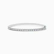 The Pave Classica 14K White Gold Diamond Bangle features a thin, silver design with a row of sparkling diamonds (0.98 TCW) along the top half, shown against a plain white background.