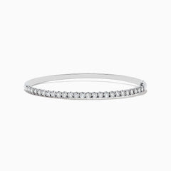 The Pave Classica 14K White Gold Diamond Bangle features a thin, silver design with a row of sparkling diamonds (0.98 TCW) along the top half, shown against a plain white background.