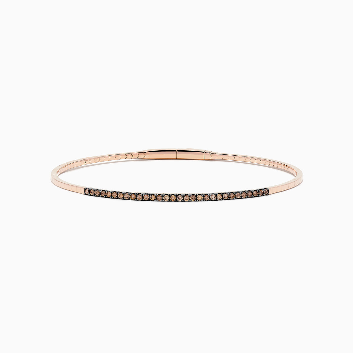 The 14K Rose Gold Espresso Diamond Bangle features a slim, polished design with a row of dark espresso diamonds set along the front for a minimalist, elegant look.