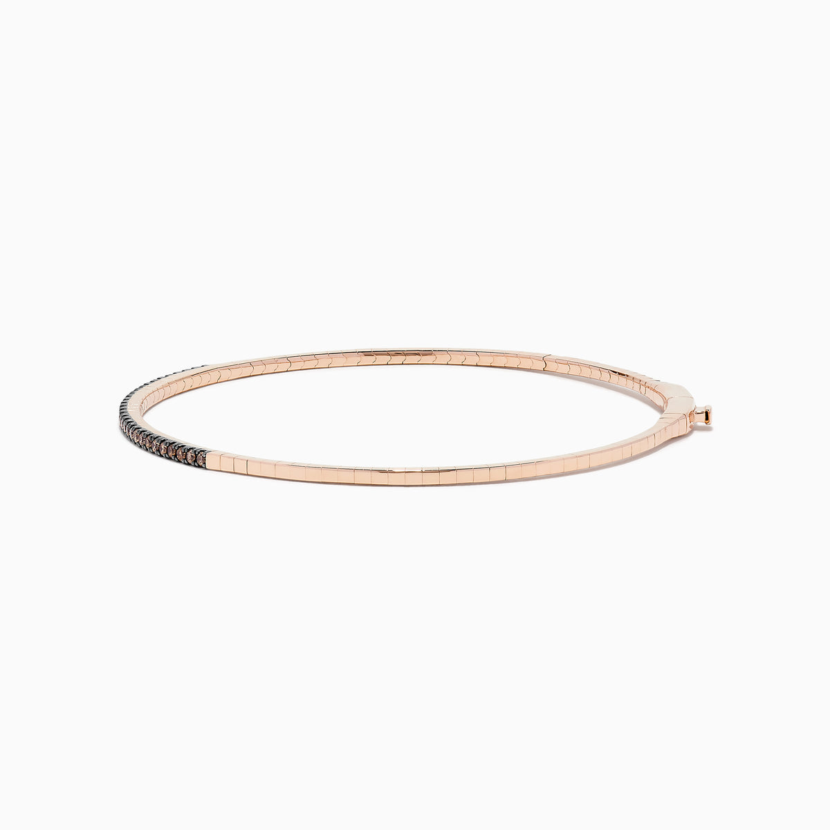 The 14K Rose Gold Espresso Diamond Bangle features a slim, polished design with a row of dark espresso diamonds set along the front for a minimalist, elegant look.