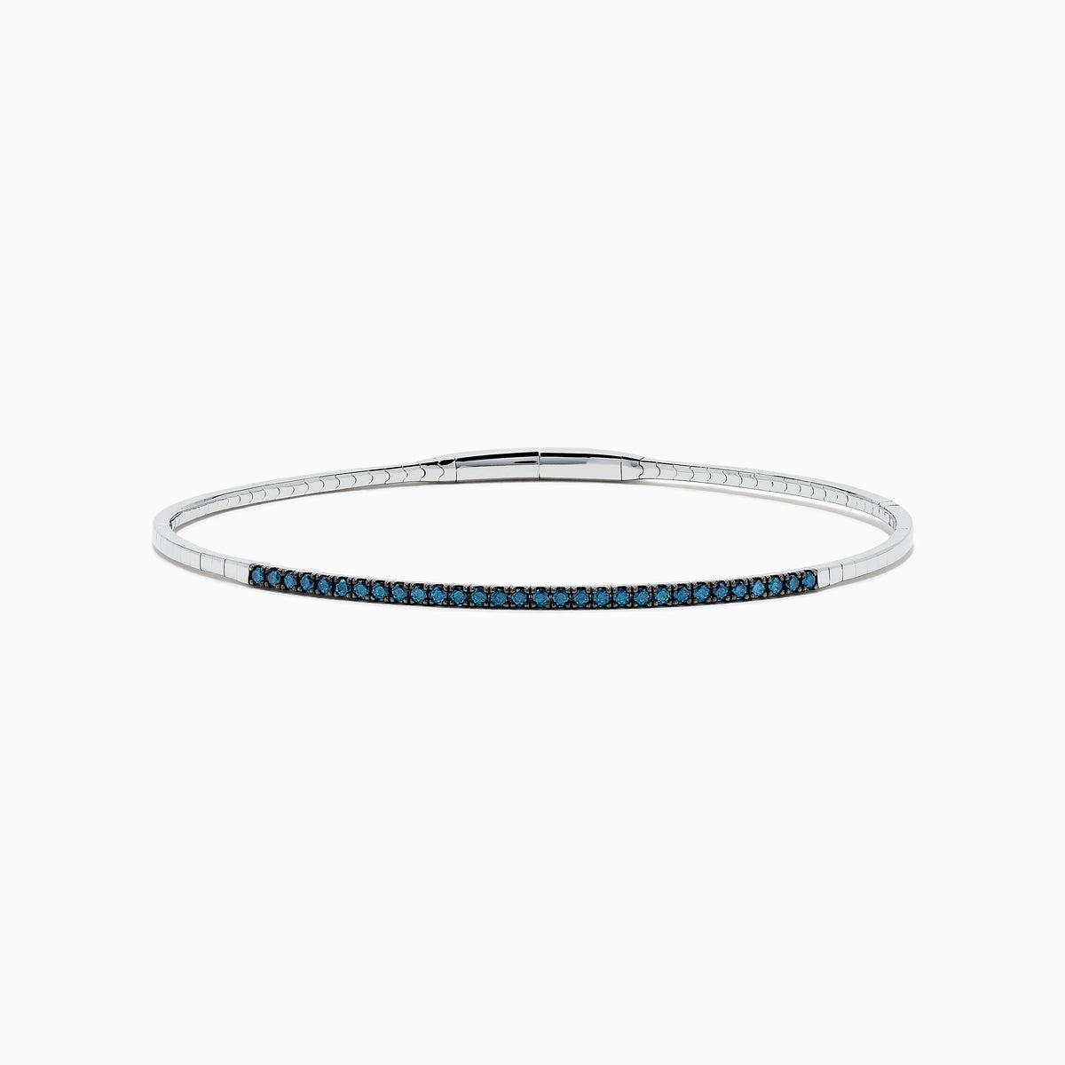 The Bella Bleu 14K White Gold Blue Diamond Bangle showcases a slim white gold design accented with brilliant blue diamonds, offering an elegant sparkle to any ensemble.