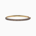 The 14K Yellow Gold Espresso Diamond Pave Bangle, 3.12 TCW, features two rows of sparkling espresso diamonds set along the outer surface for a sleek and elegant look.