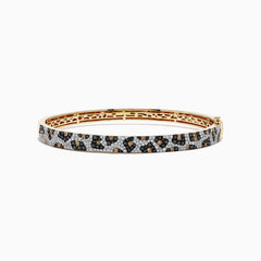 The Signature 14K Yellow Gold Diamond Panther Spot Bangle showcases a leopard print with black, brown, and white stones and an elegant openwork interior design.